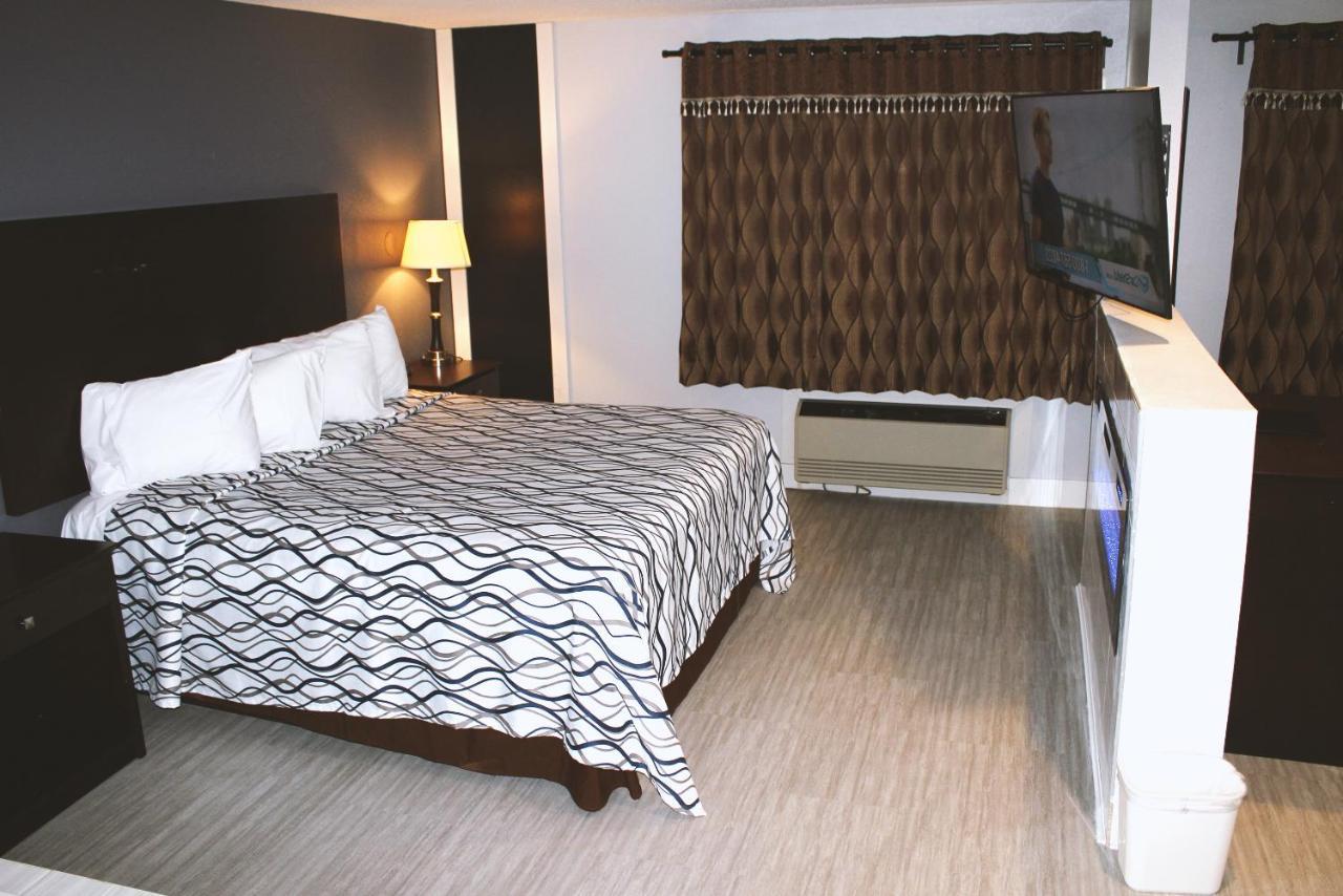 Coratel Inn & Suites By Jasper Hastings Luaran gambar