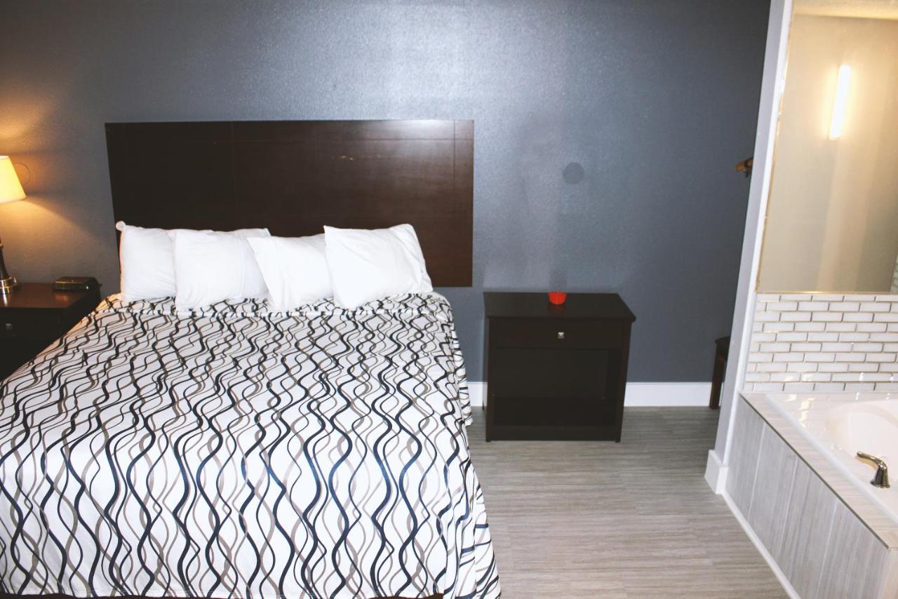 Coratel Inn & Suites By Jasper Hastings Luaran gambar