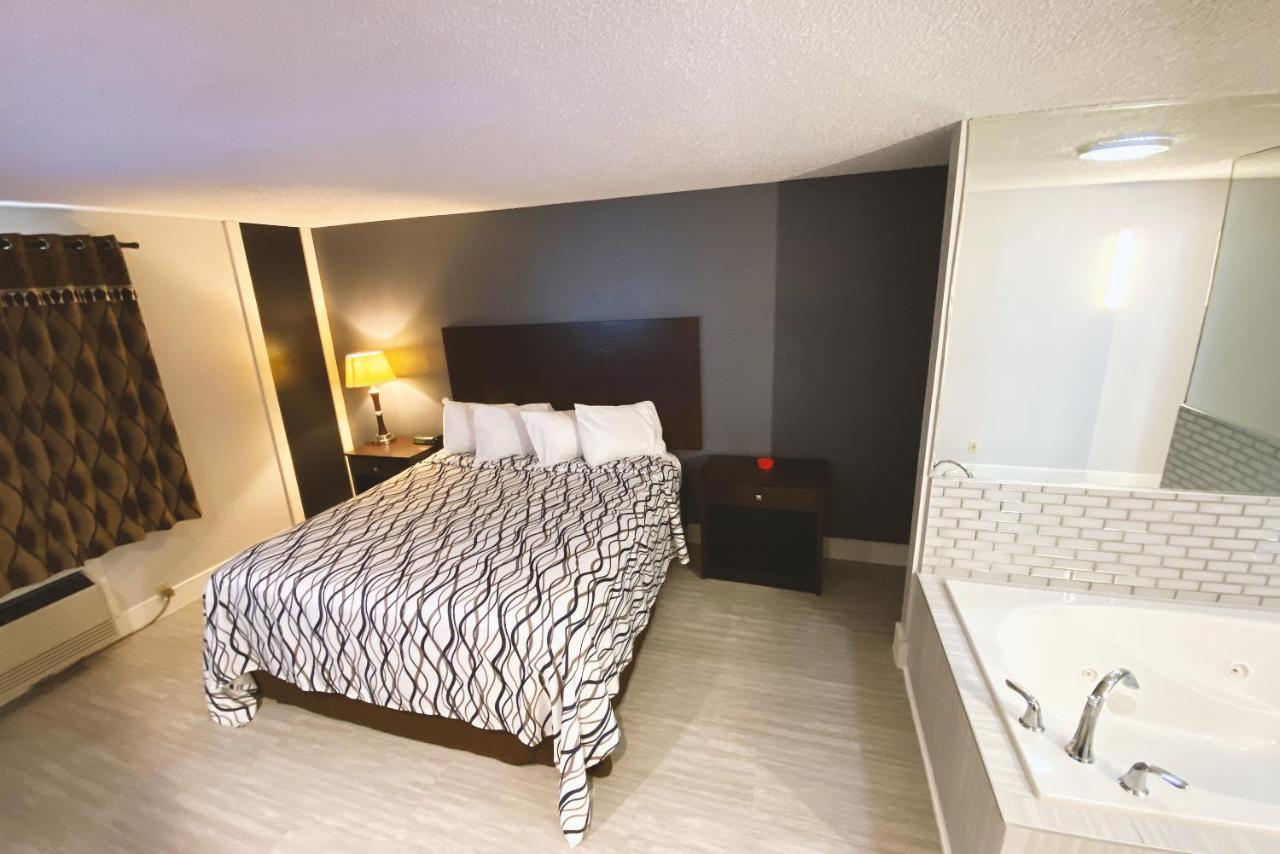 Coratel Inn & Suites By Jasper Hastings Luaran gambar