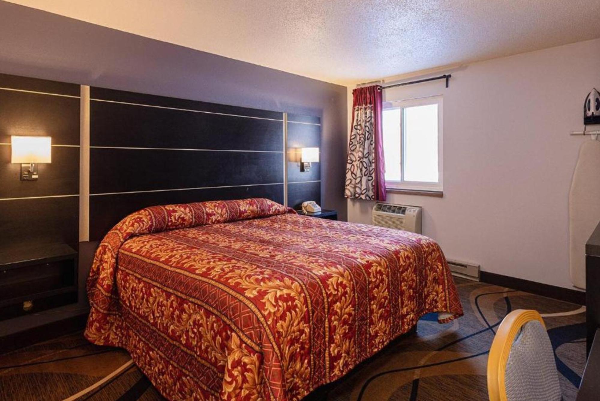 Coratel Inn & Suites By Jasper Hastings Luaran gambar