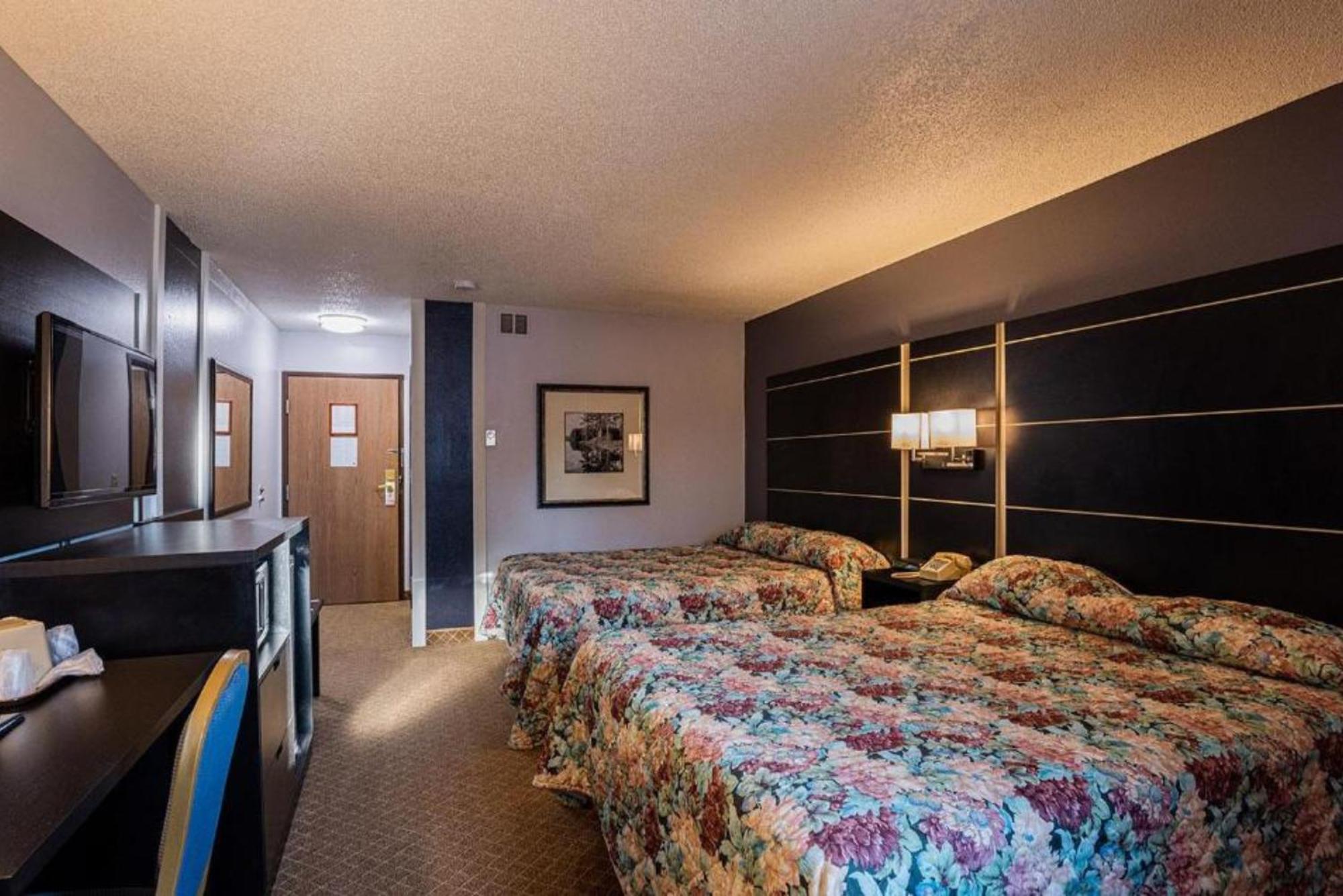 Coratel Inn & Suites By Jasper Hastings Luaran gambar