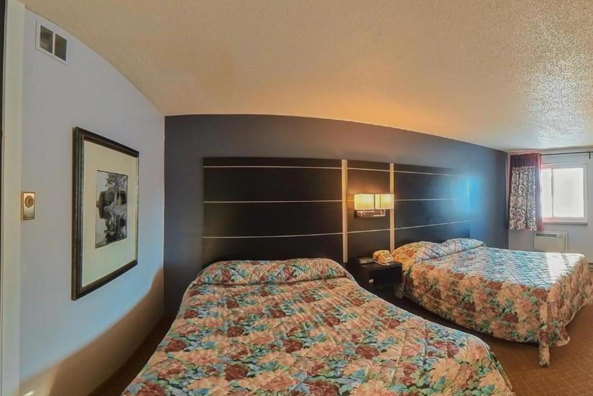 Coratel Inn & Suites By Jasper Hastings Luaran gambar